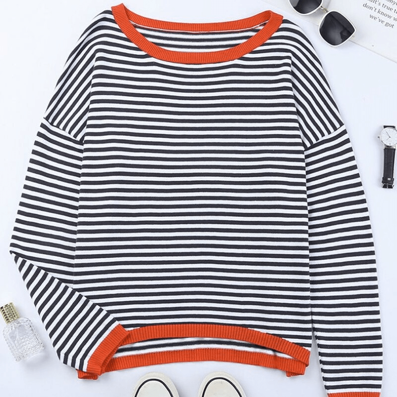 Sweaters in blue with orange -colored edge and striped pattern