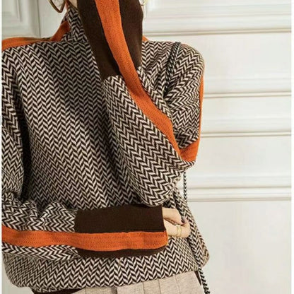 Rolling collar sweater with a geometric knitting pattern