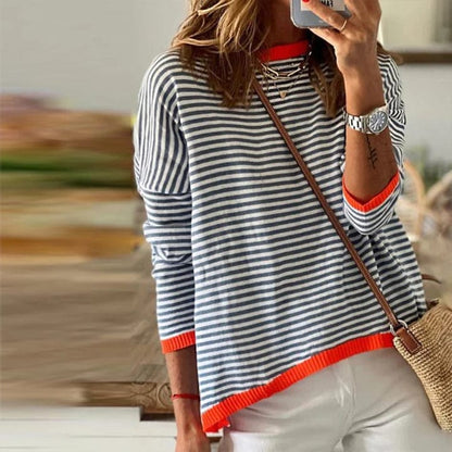 Sweater with blue stripes and orange hem