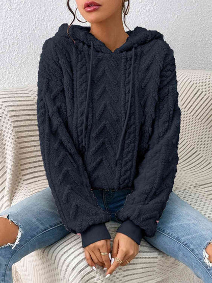 Sweaters with a cord and long arm in a two -tone design for women